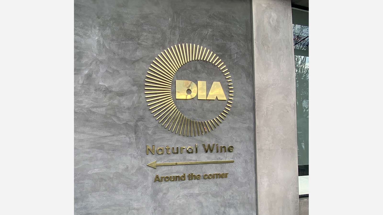 good dia llc logo sign mounted on the exterior wall