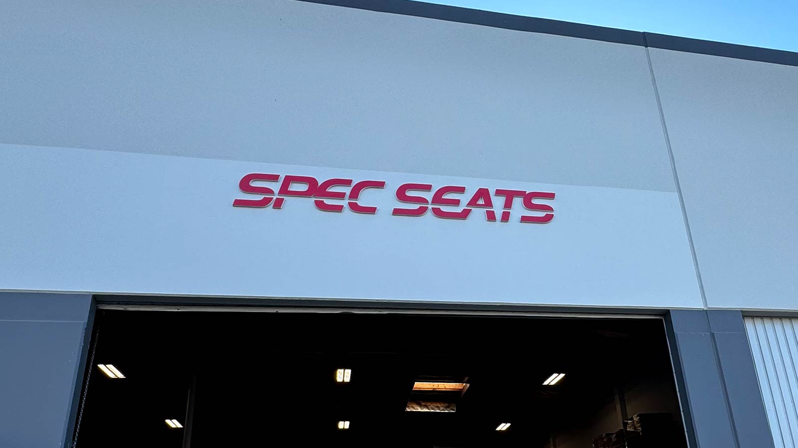 spec seats custom letter sign mounted on the facade