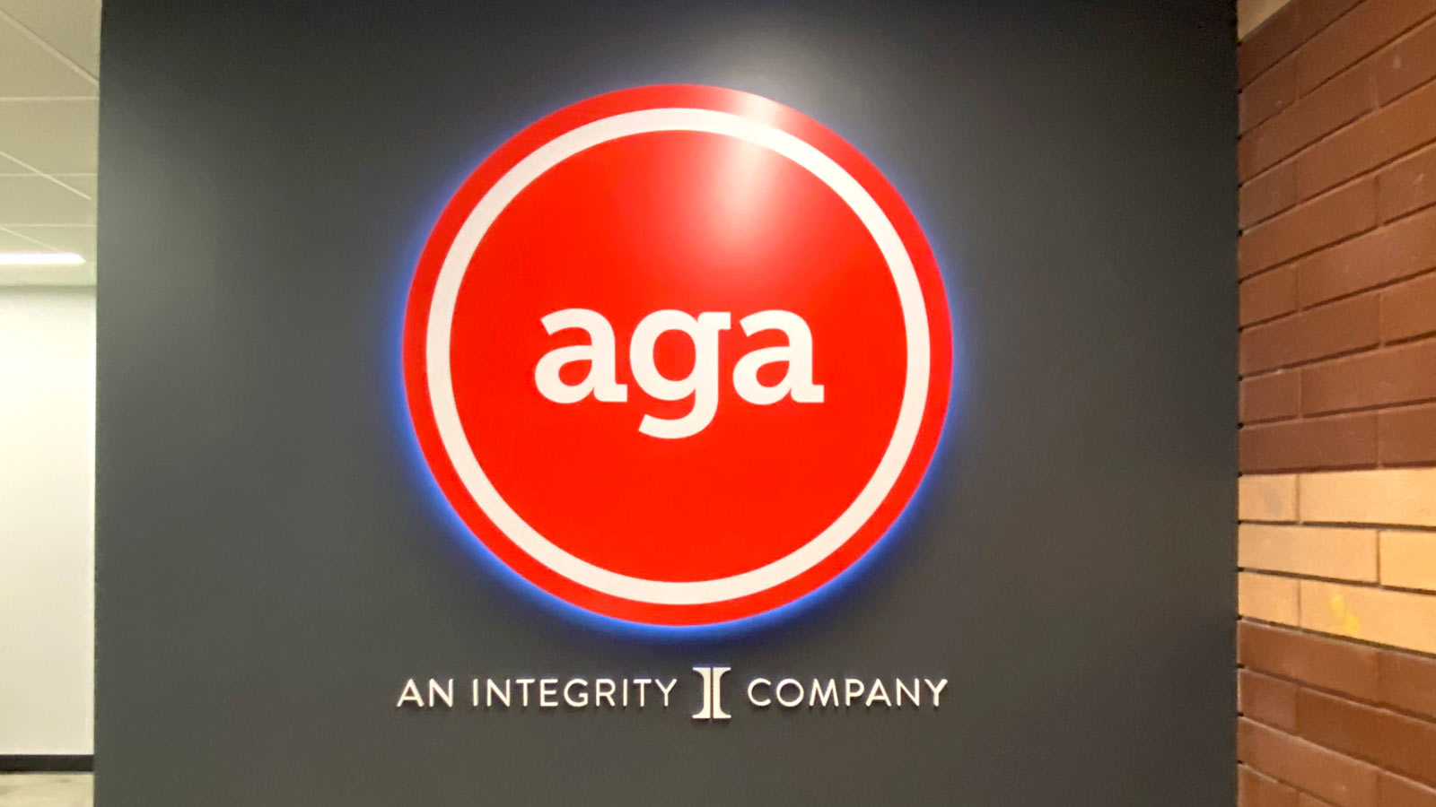 applied general agency logo sign installed in the lobby