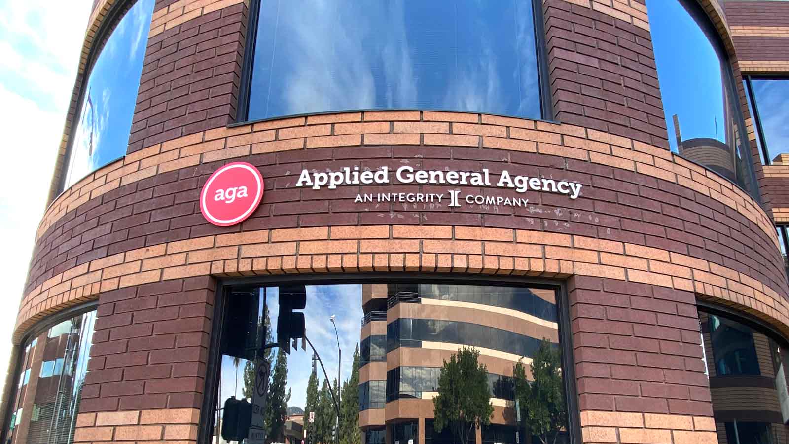 applied general agency outdoor sign installed on the facade