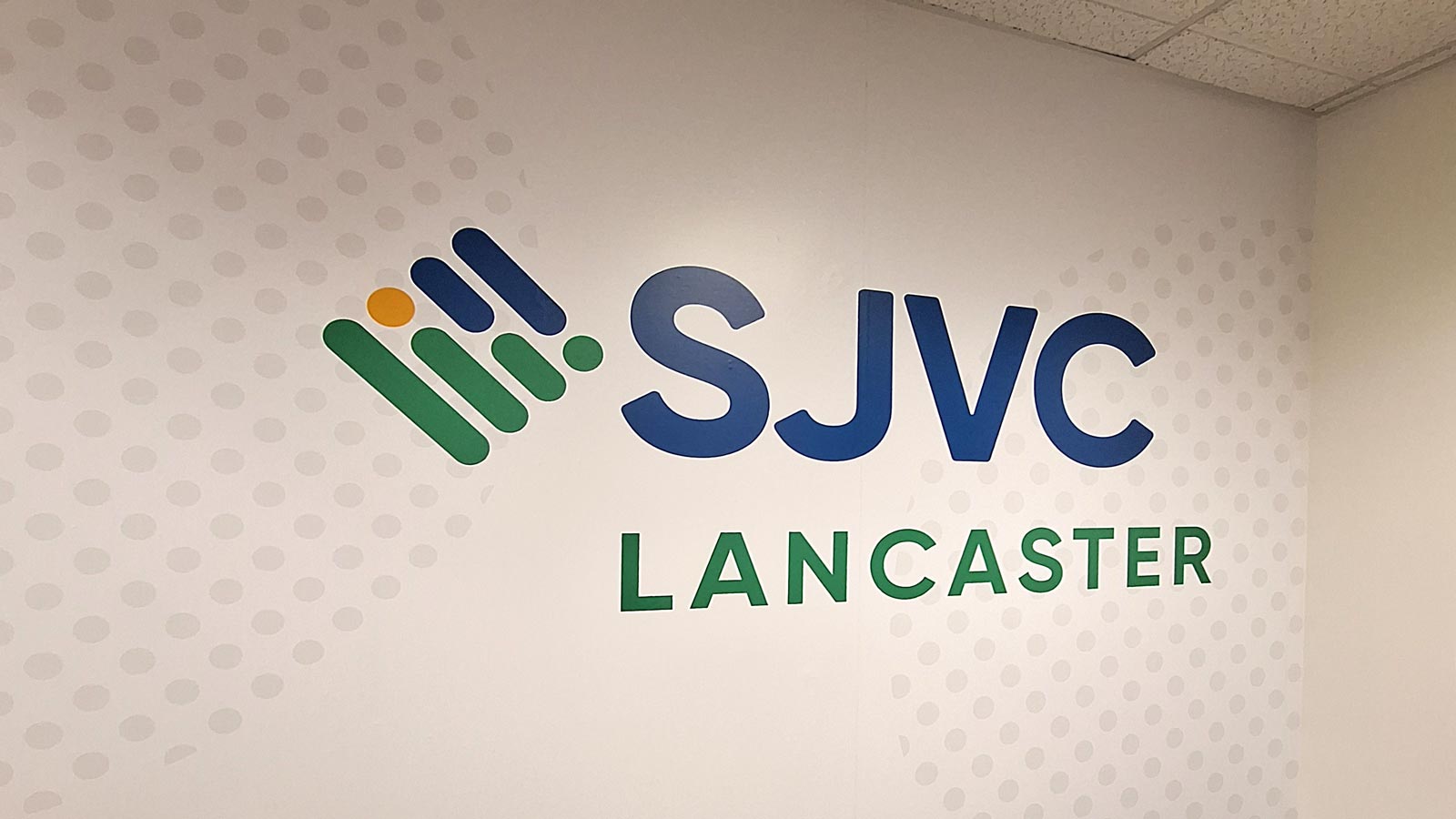sjvc custom signage applied to the interior wall