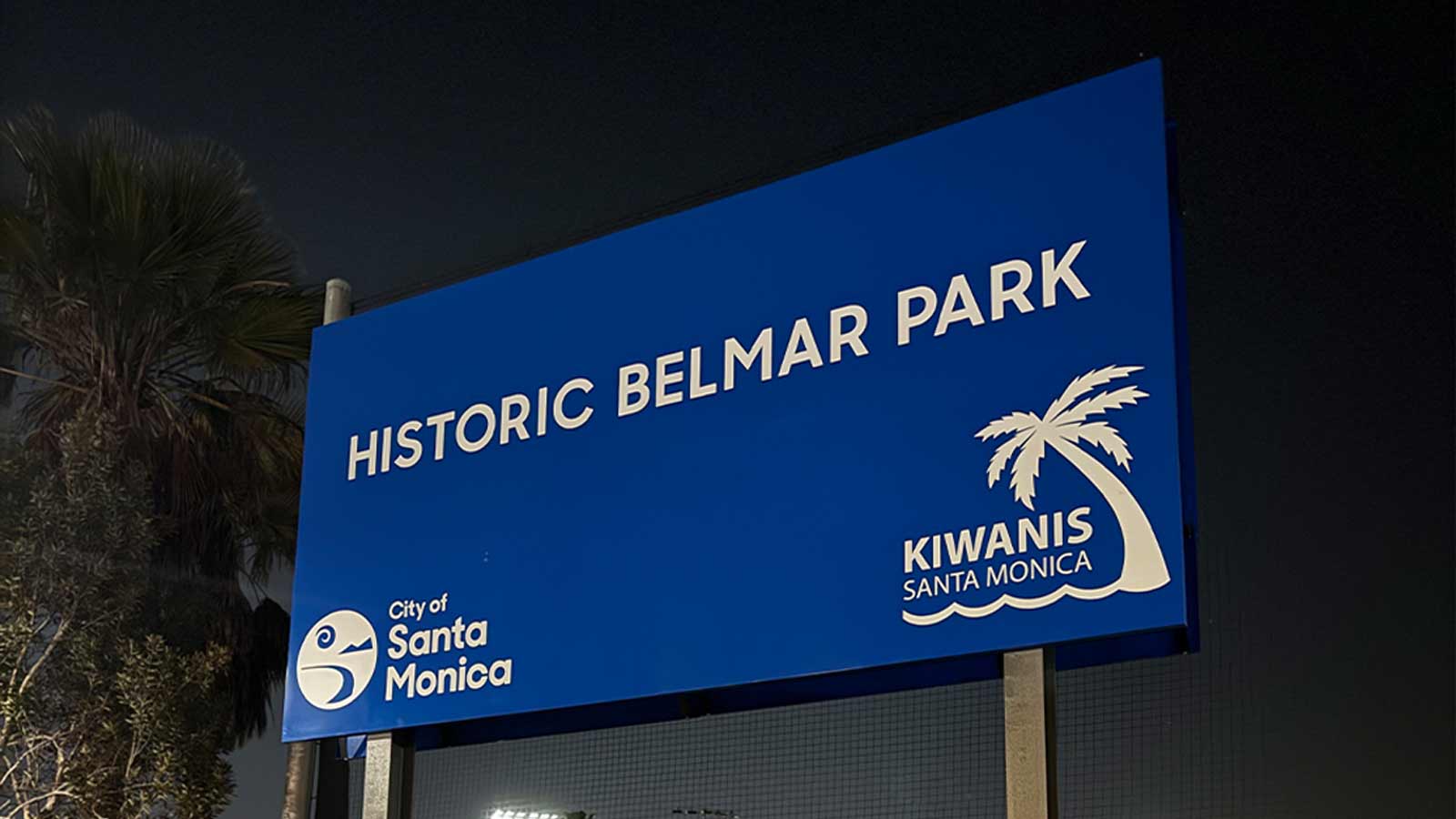 city of santa monica outdoor display in front of a fence