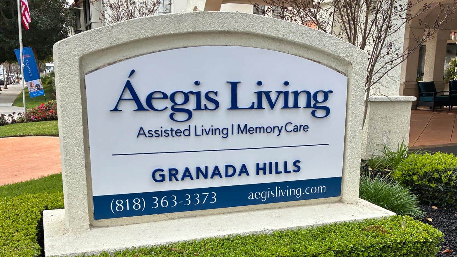 aegis living monument sign face replaced at entrance
