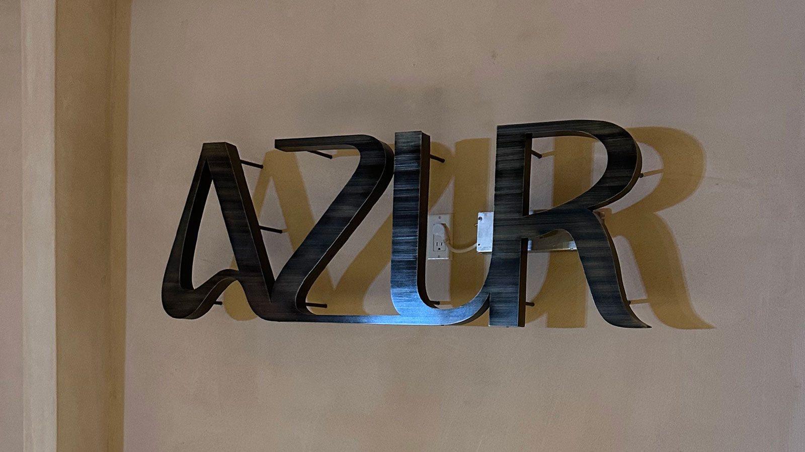 azur back-lit reverse channel letters on interior wall