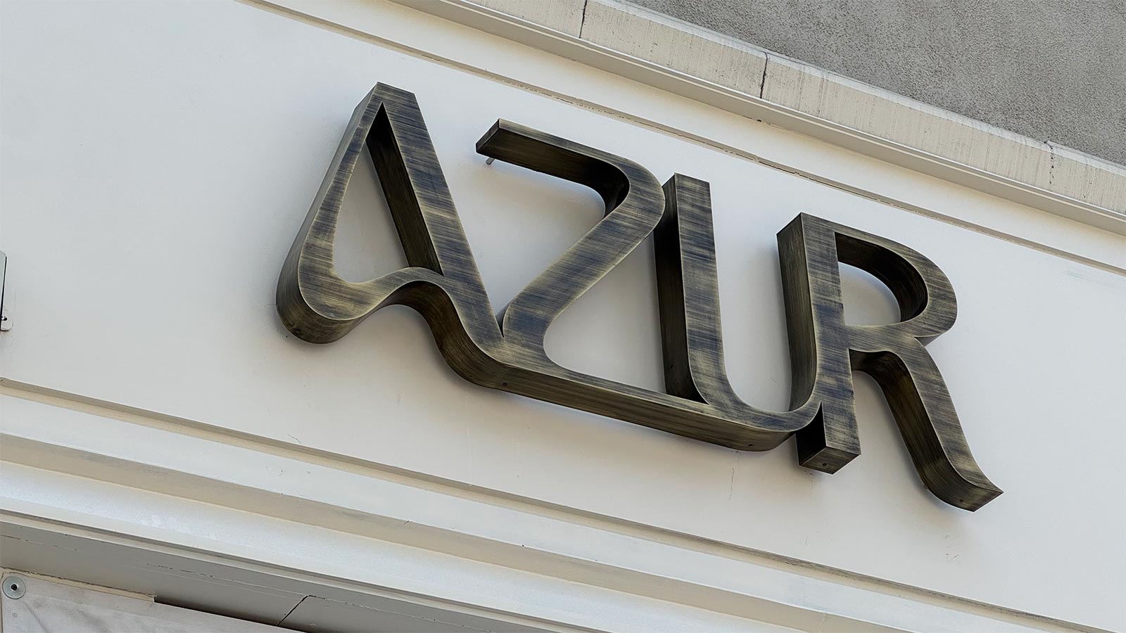 azur reverse channel letters mounted on storefront
