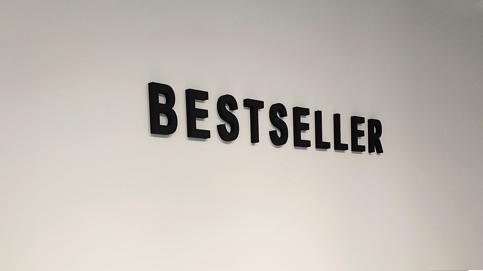 bestseller black acrylic letters mounted on office wall