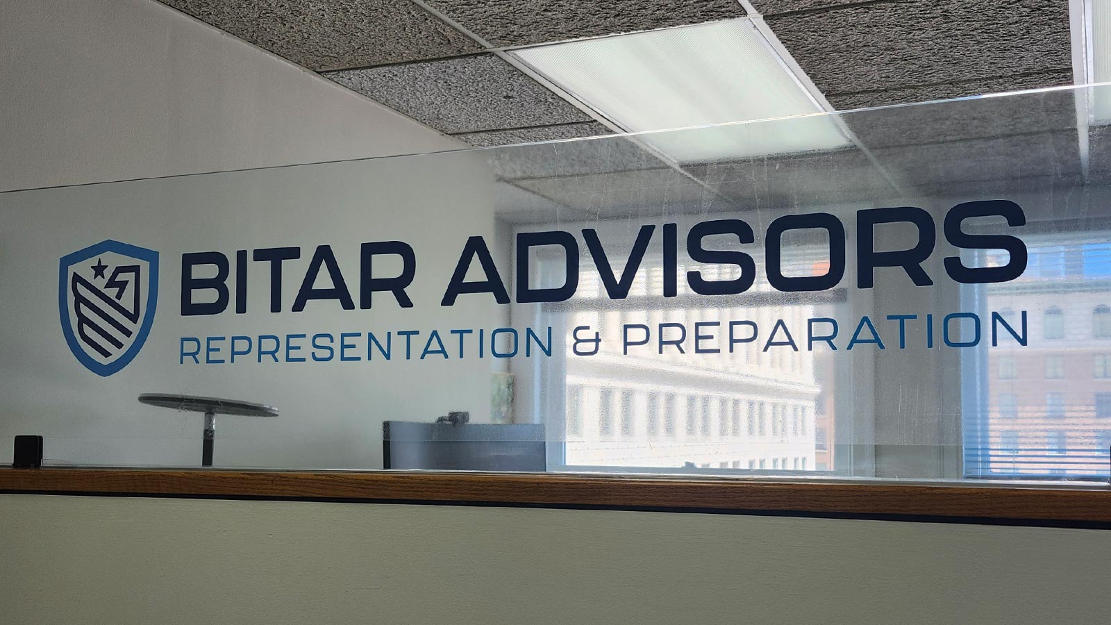 bitar advisors vinyl decal applied on glass partition