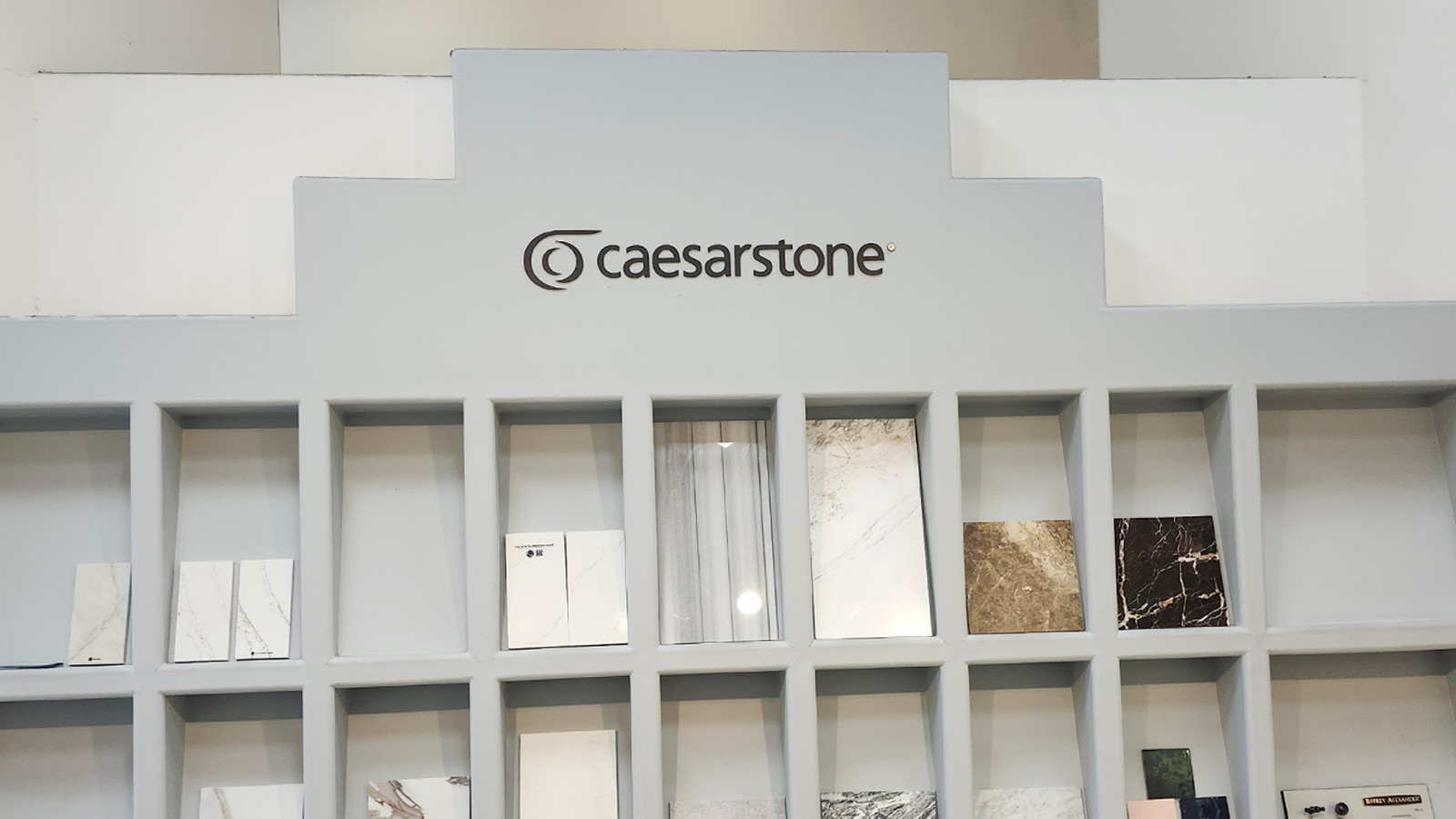 caesarstone dibond letters on showroom wall