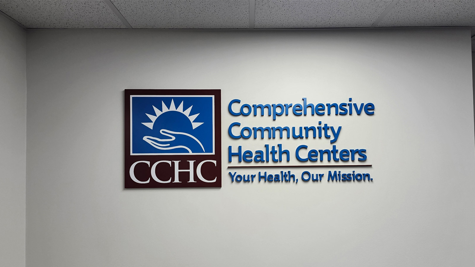cchc painted acrylic letters and logo on office wall