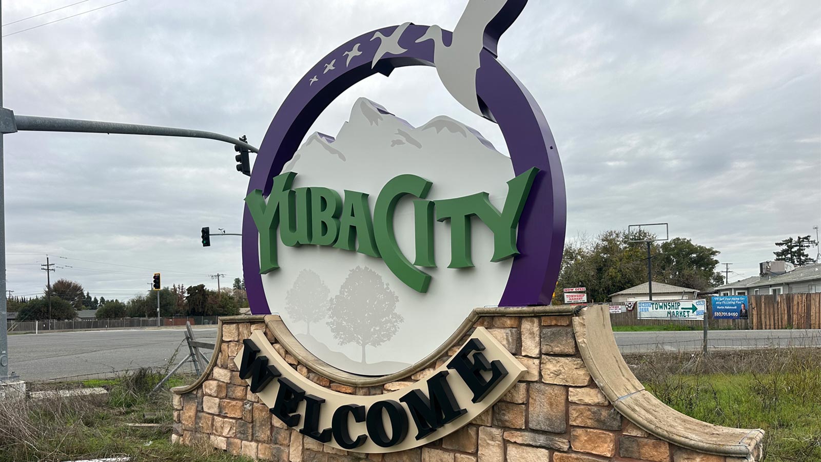 city of yuba city welcome monument sign on masonry base