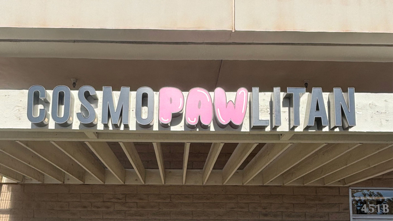 cosmopawlitan front-lit channel letters on storefront