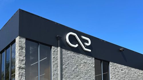 cx2 backlit channel logo mounted on building facade