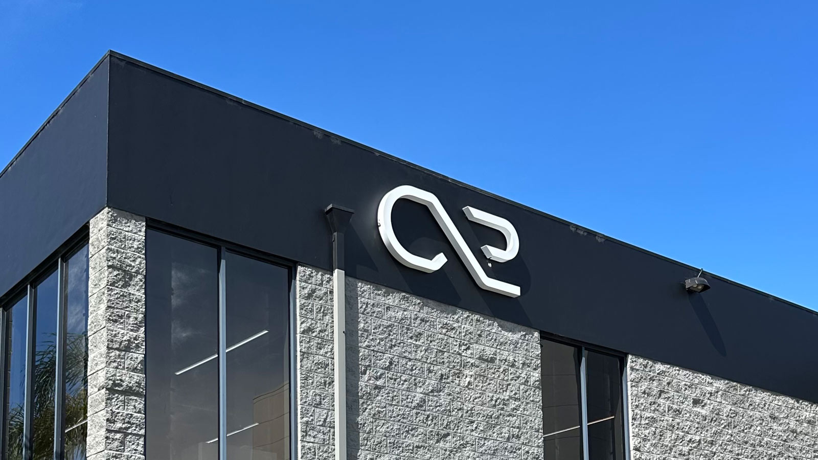 cx2 backlit channel logo mounted on building facade