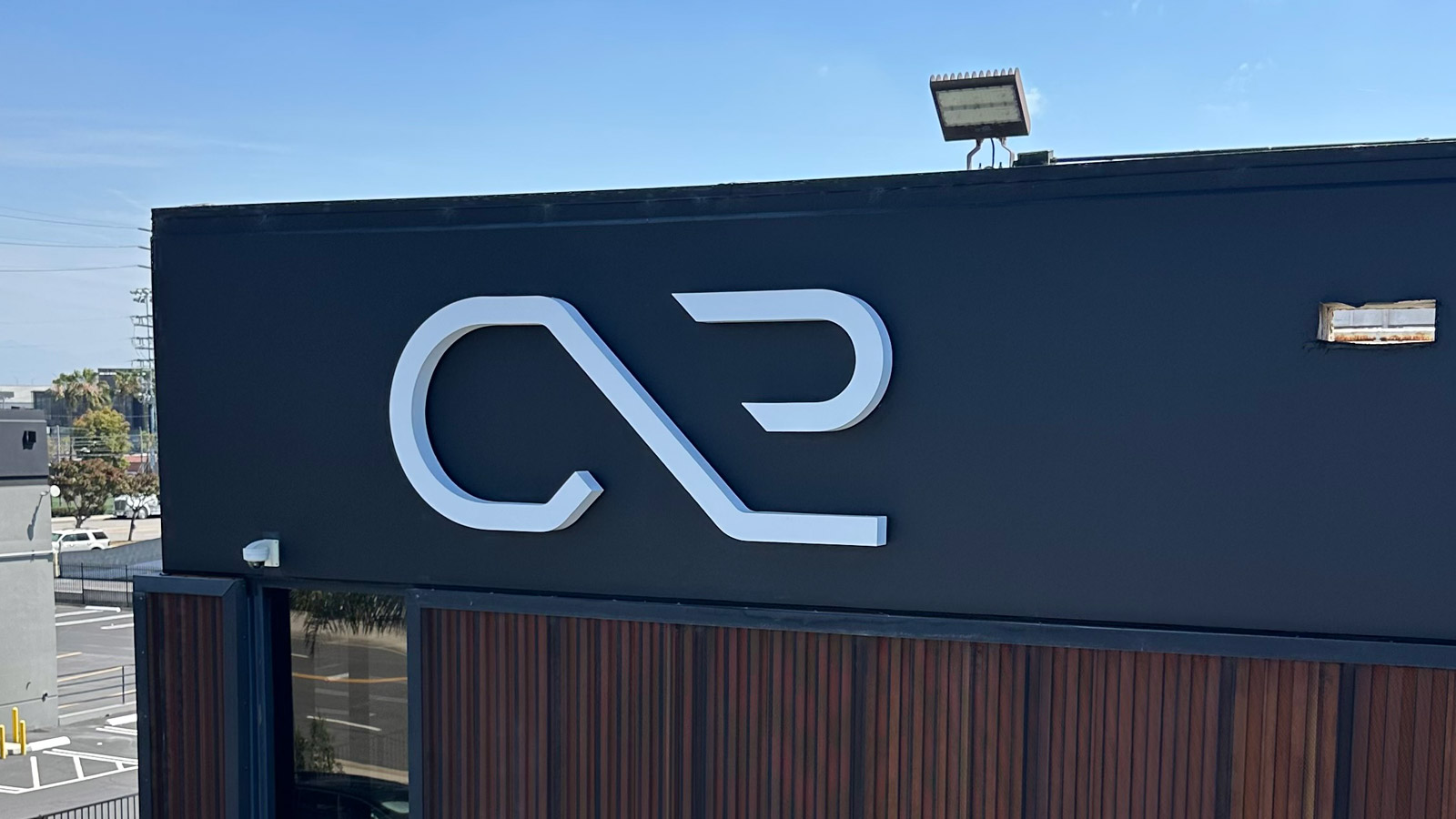 cx2 backlit channel logo mounted on storefront