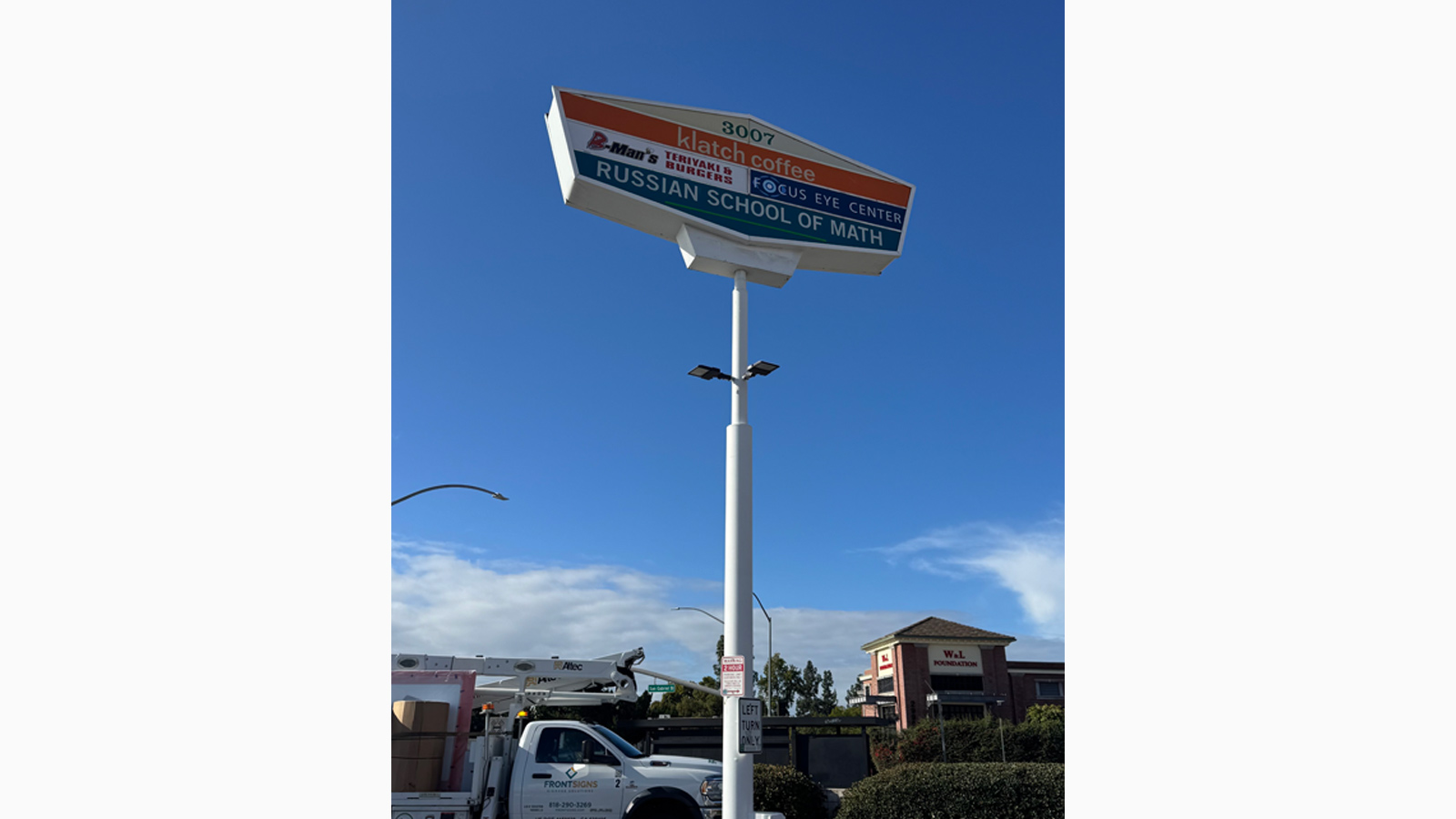focus eye center pylon sign face replaced outdoors