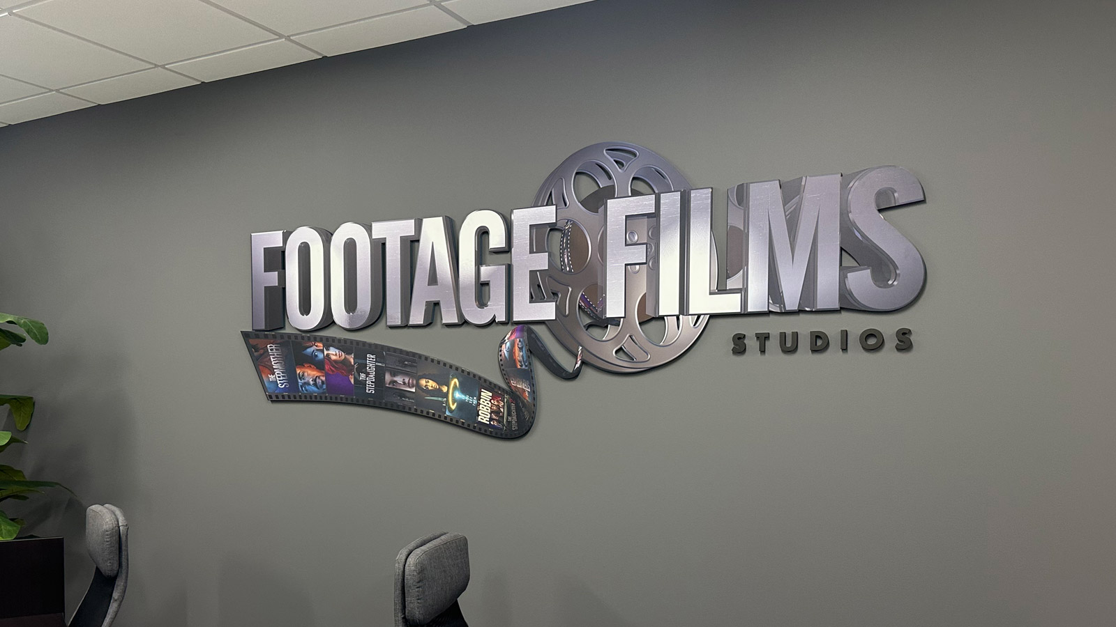 footage films studios acrylic logo on office wall