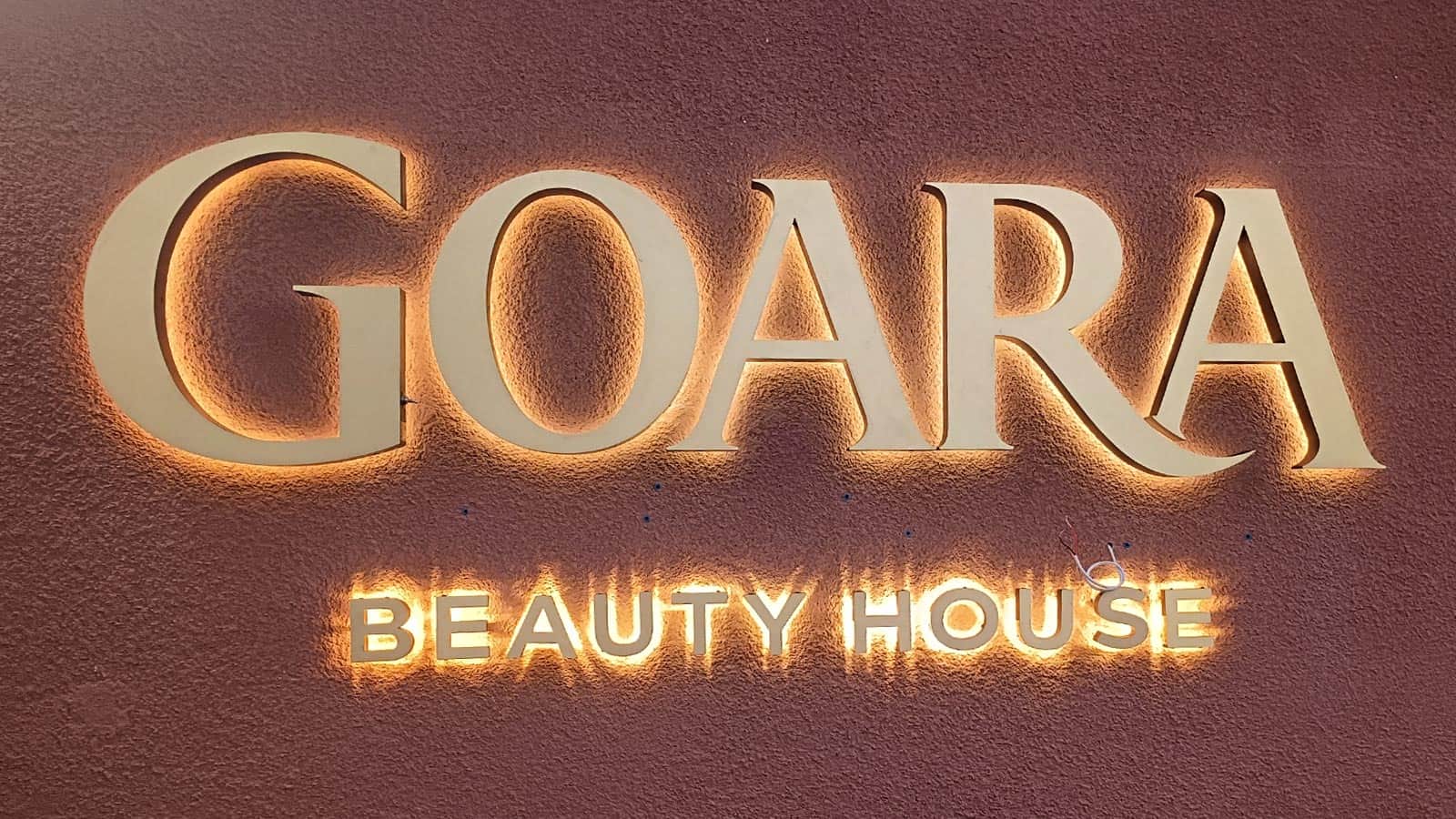 goara beauty house halo lit letters mounted on the wall