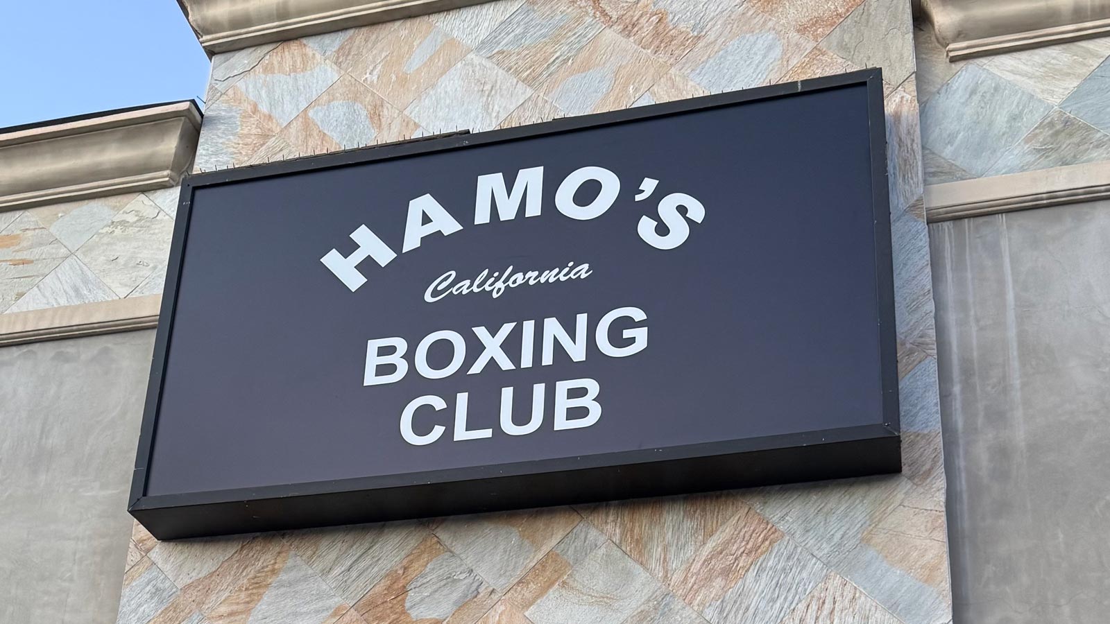 hamos boxing club lightbox face replaced on storefront