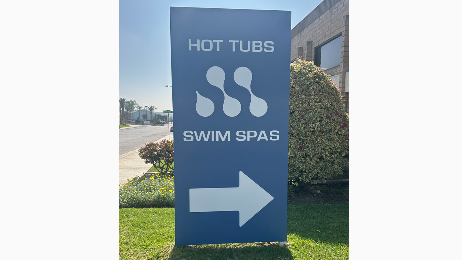hot tub swim spa outlet directional sign outdoors