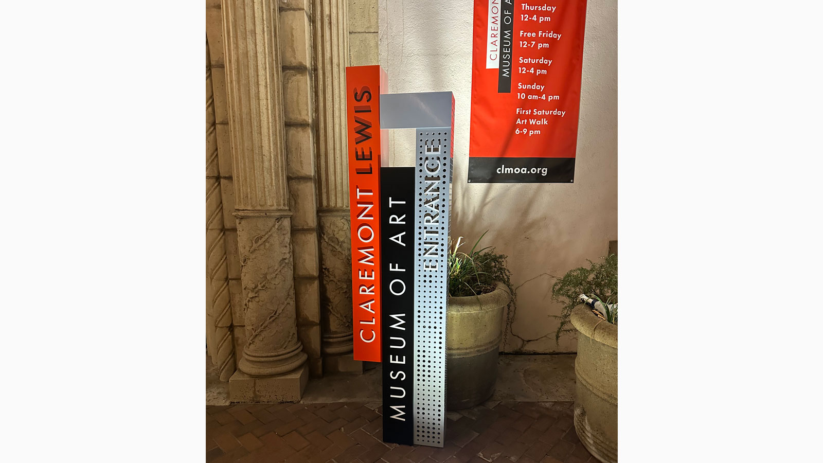 jbohn associates steel wayfinding sign for entrance