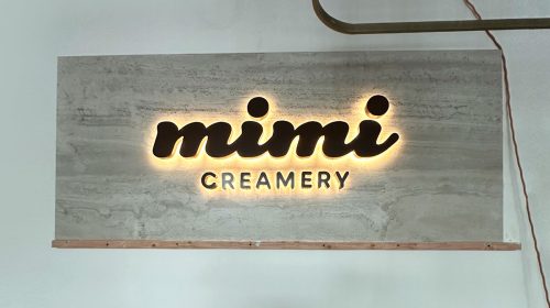 mimi creamery back lit channel letters on interior wall