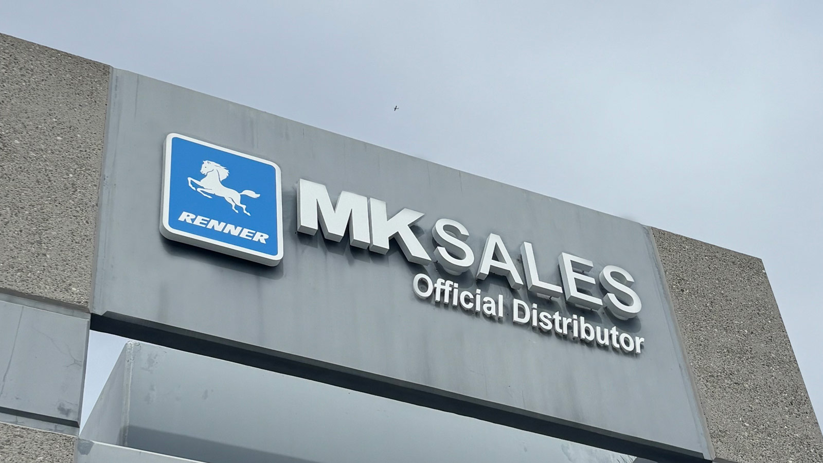 mk sales light box and letters mounted on building facade