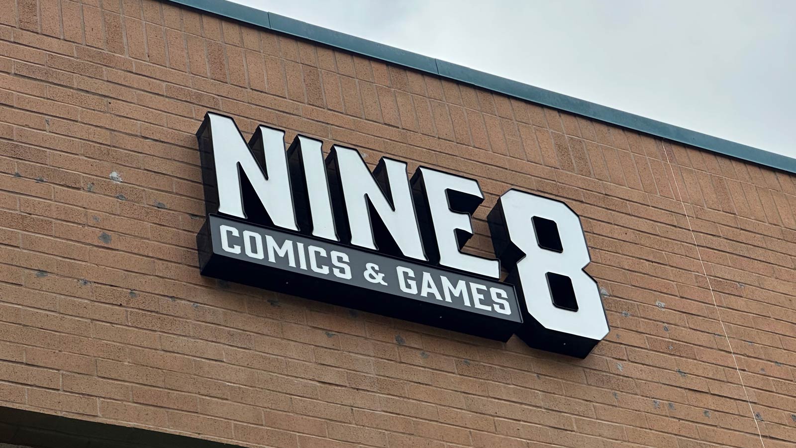 nine8 llc illuminated channel letters reinstalled on wall