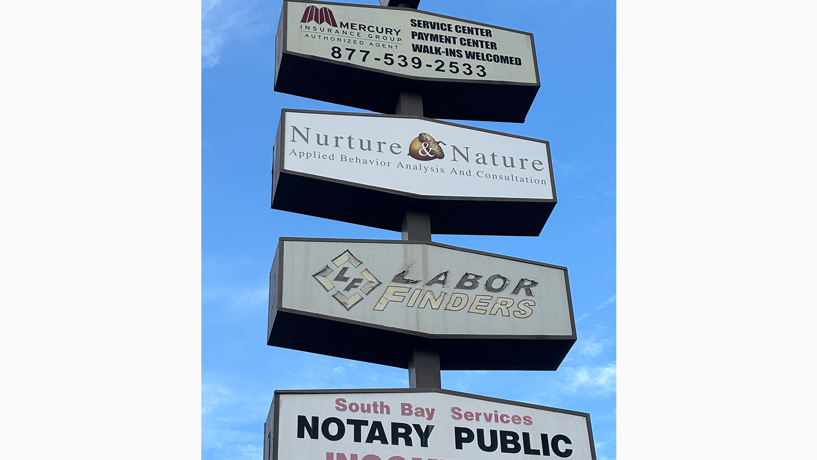 nurture and nature pylon sign face on tenant pole