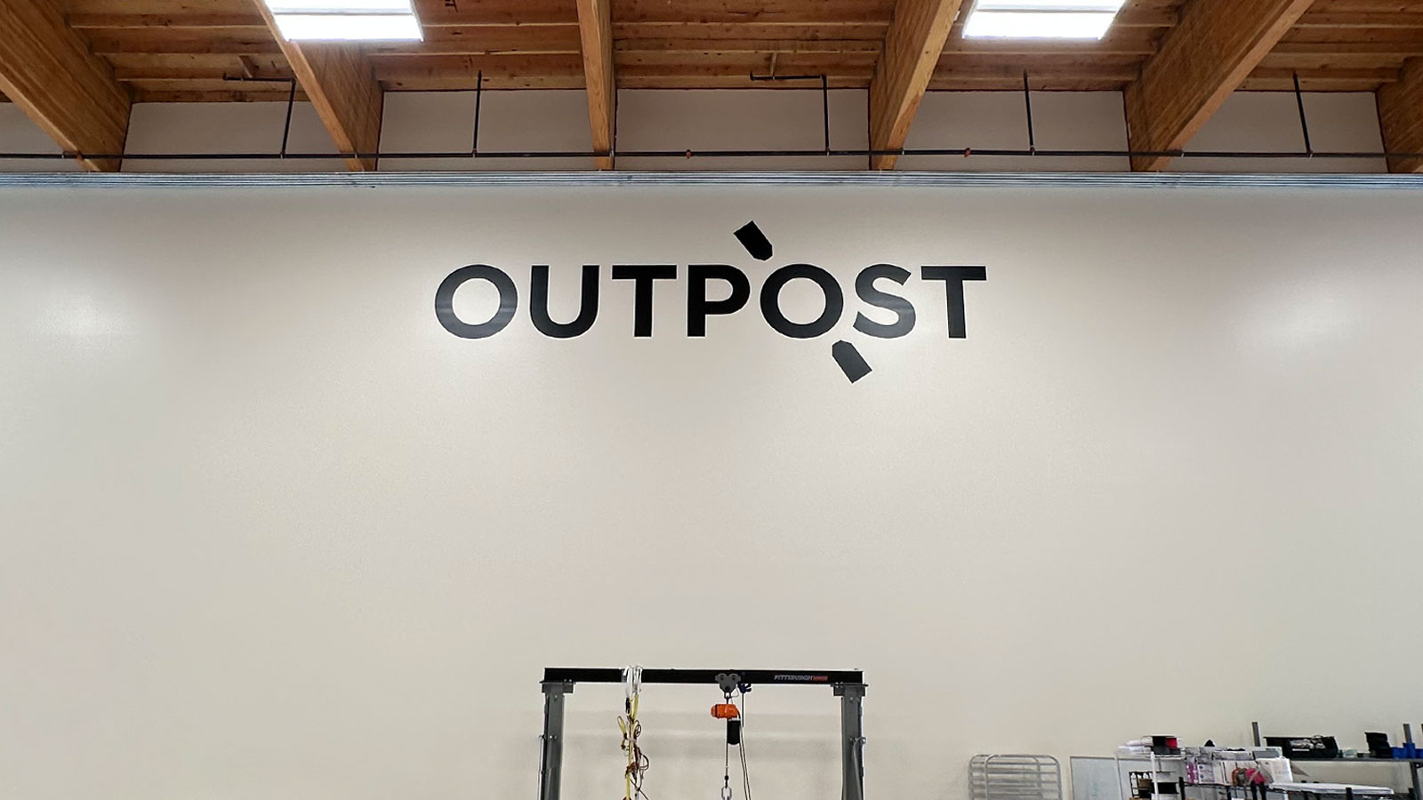 outpost technologies vinyl lettering on interior wall