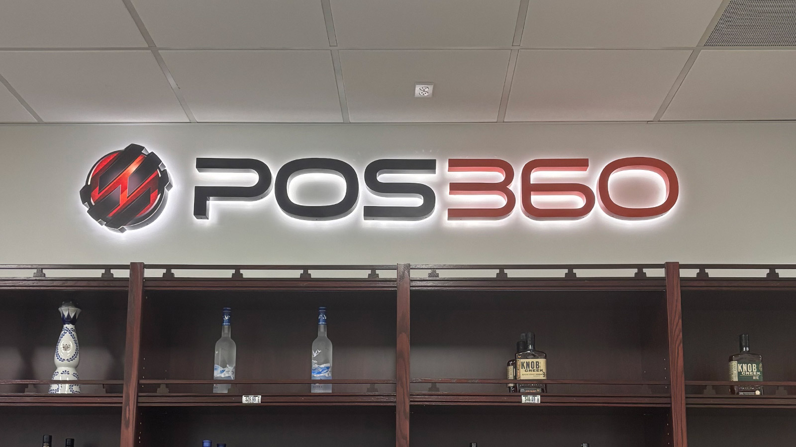pos360 dual lit channel letters mounted on office wall