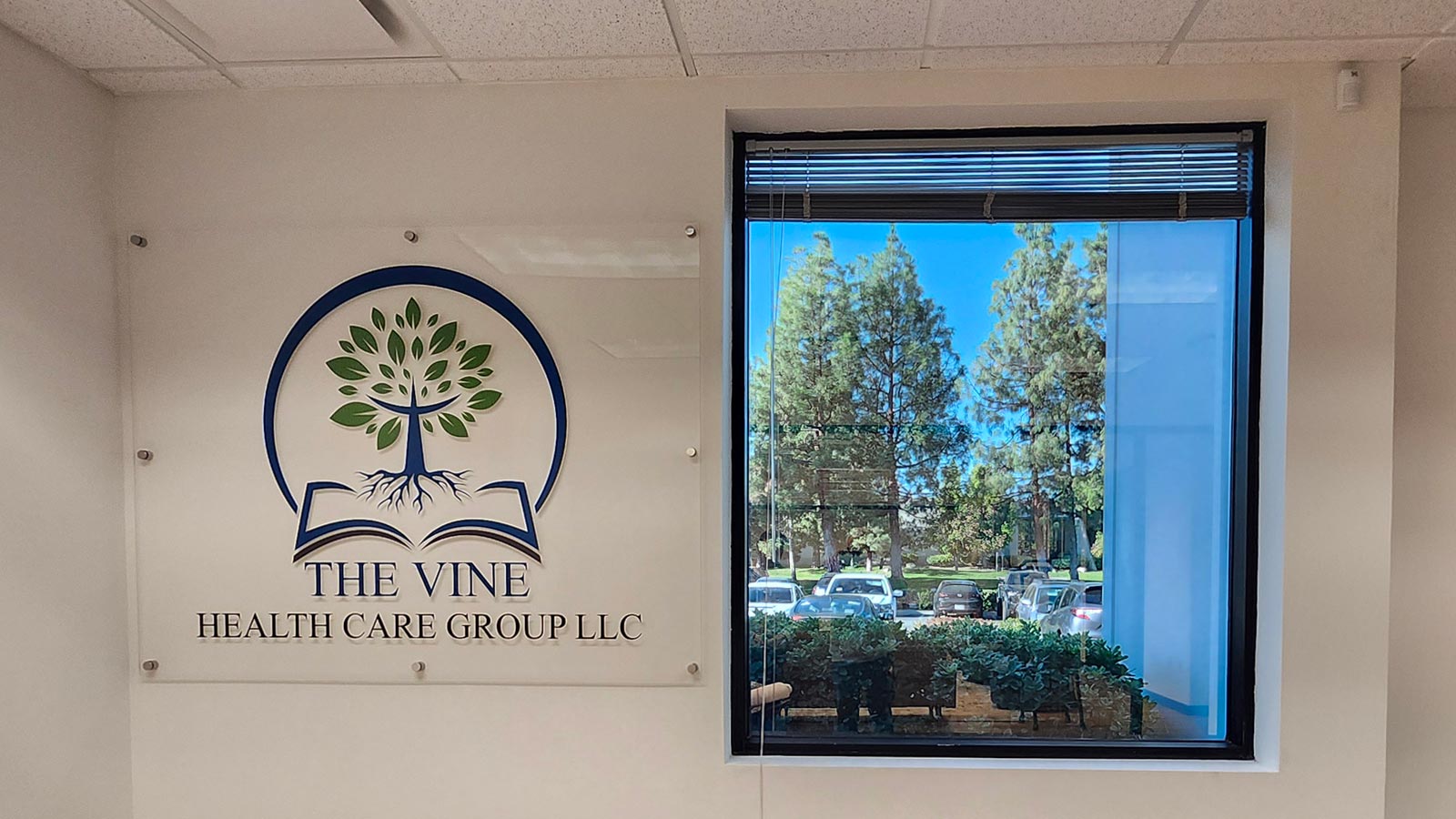 primrose home health acrylic sign monted on interior wall