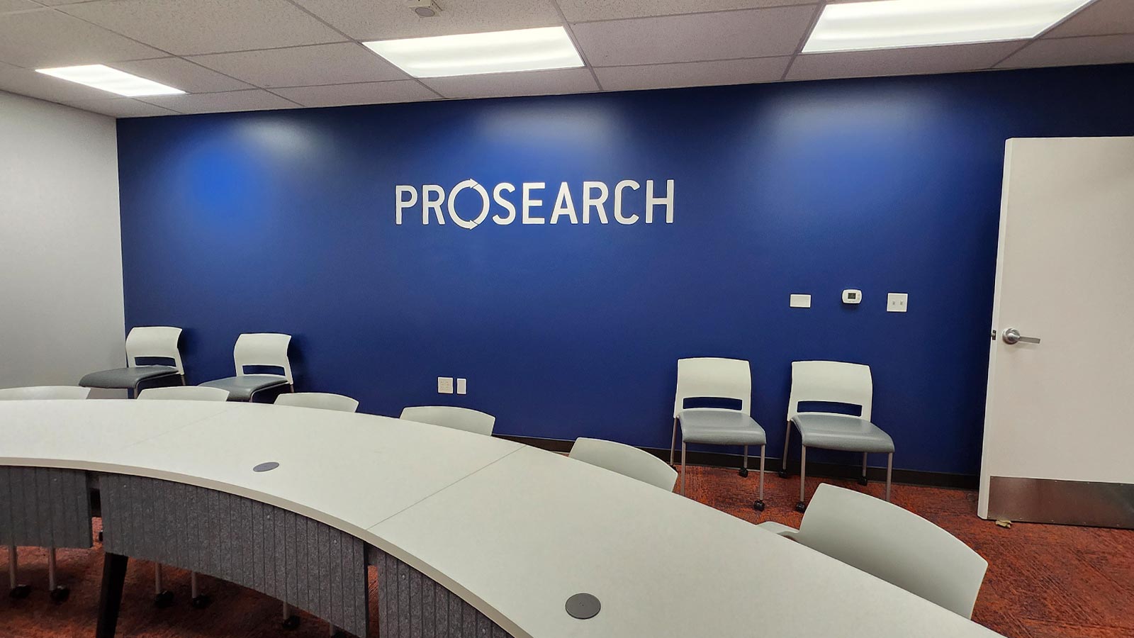 prosearch white vinyl letters applied on office wall