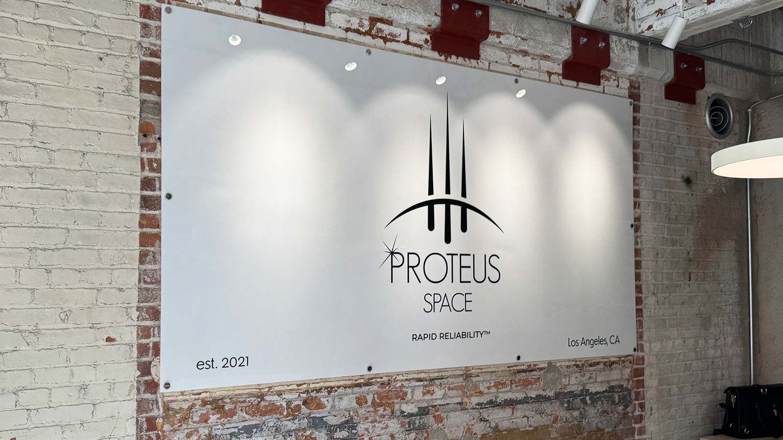 proteus space printed acrylic panel mounted on wall