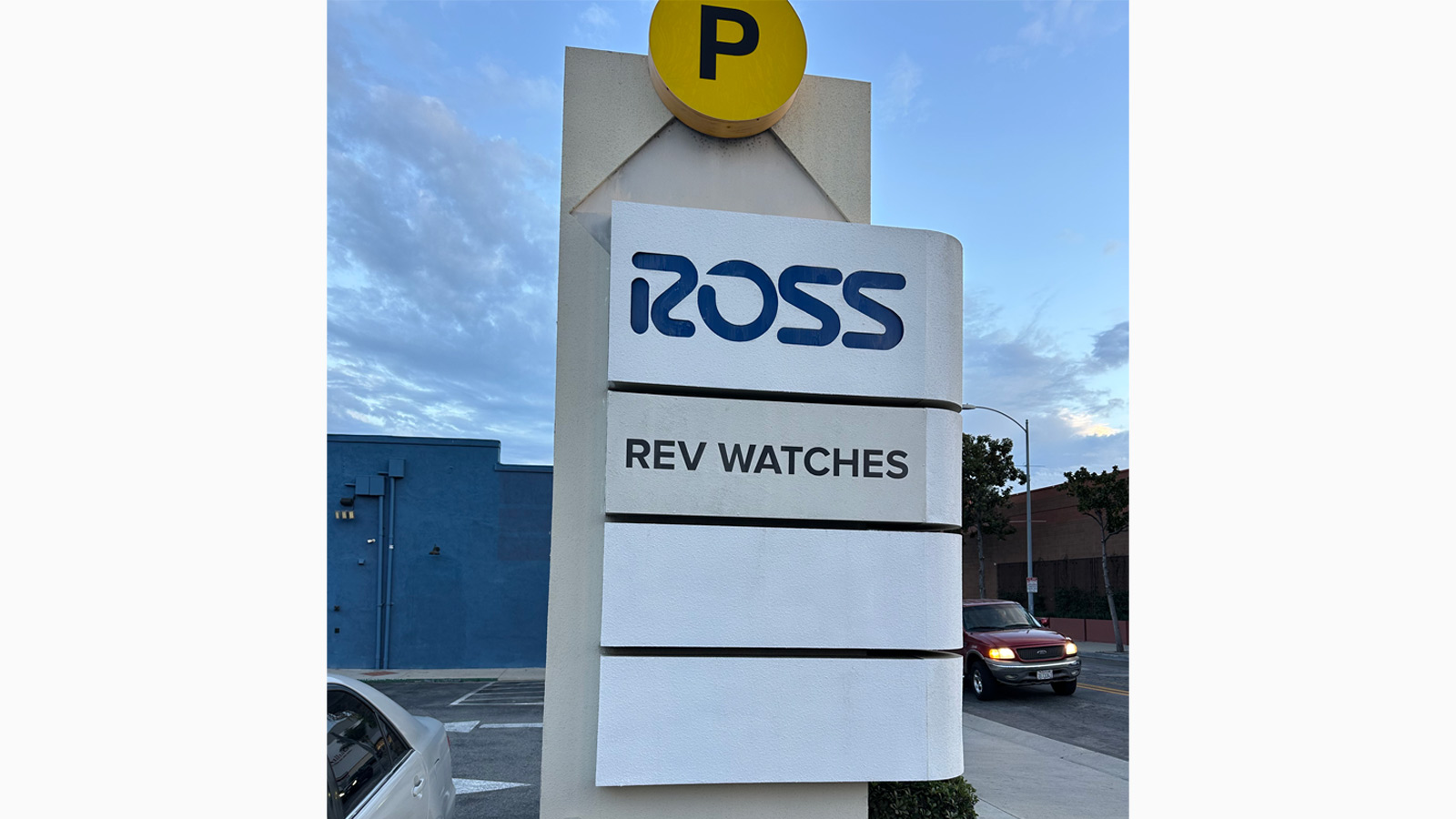 rev watches monument sign face installed outdoors