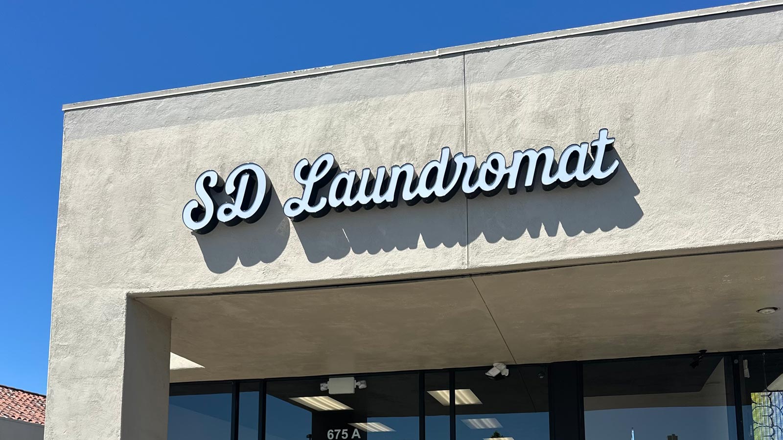 sd laundromat channel letters mounted on storefront