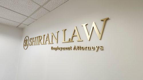 shirian law brushed gold acrylic letters on office wall