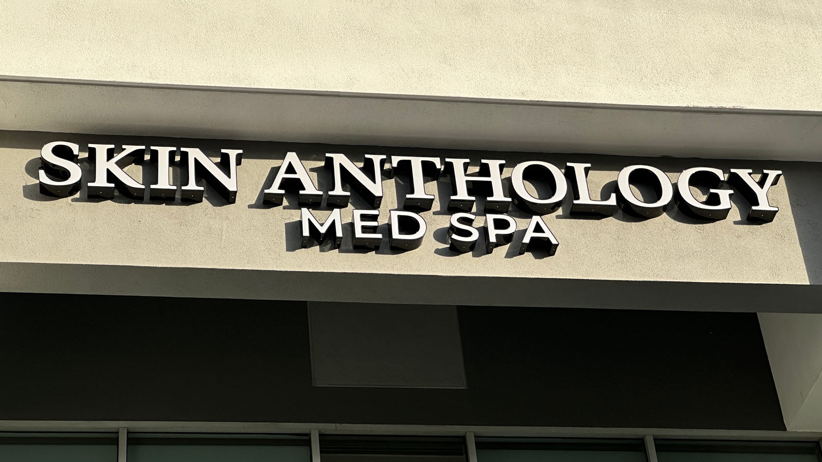 skin anthology front-lit channel letters on storefront