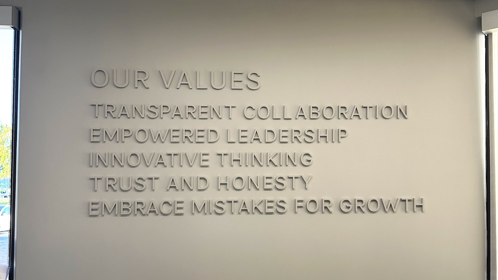 subsense inc office letter signs on the interior wall