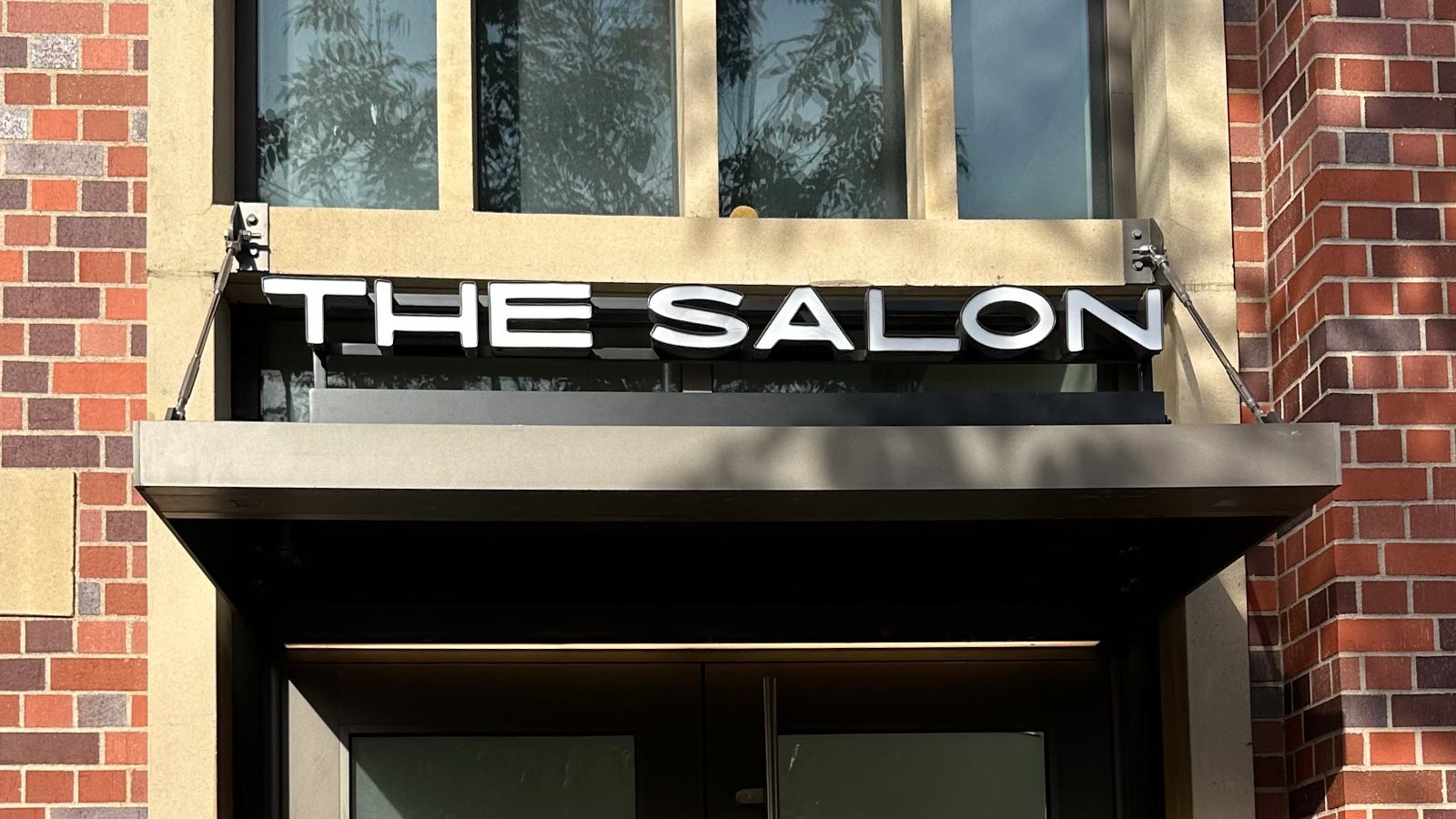 the salon usc village channel letters mounted above entrance