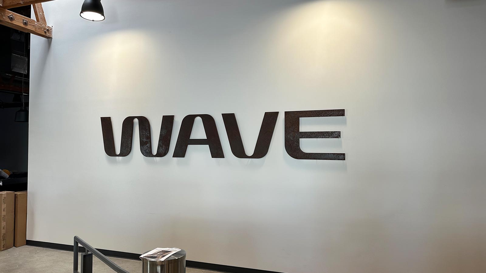 wave sports and entertainment corten steel letters on wall