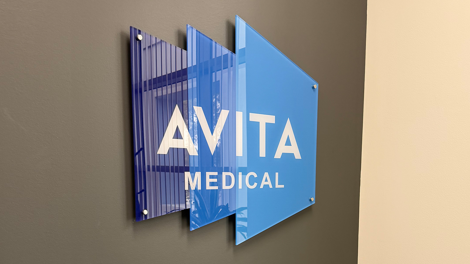 avita medical acrylic logo sign on wall
