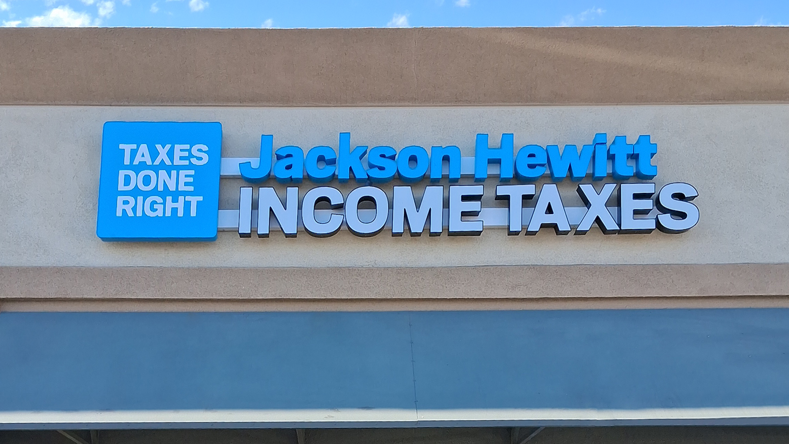 brighter future insurance channel letters on facade