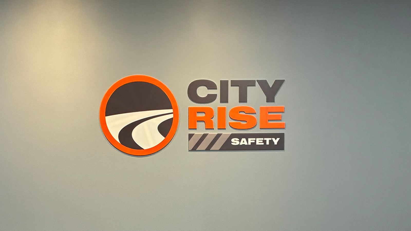 city rise safety acrylic logo sign on wall