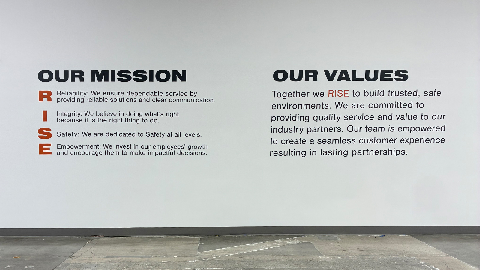 city rise safety vinyl wall lettering on warehouse wall