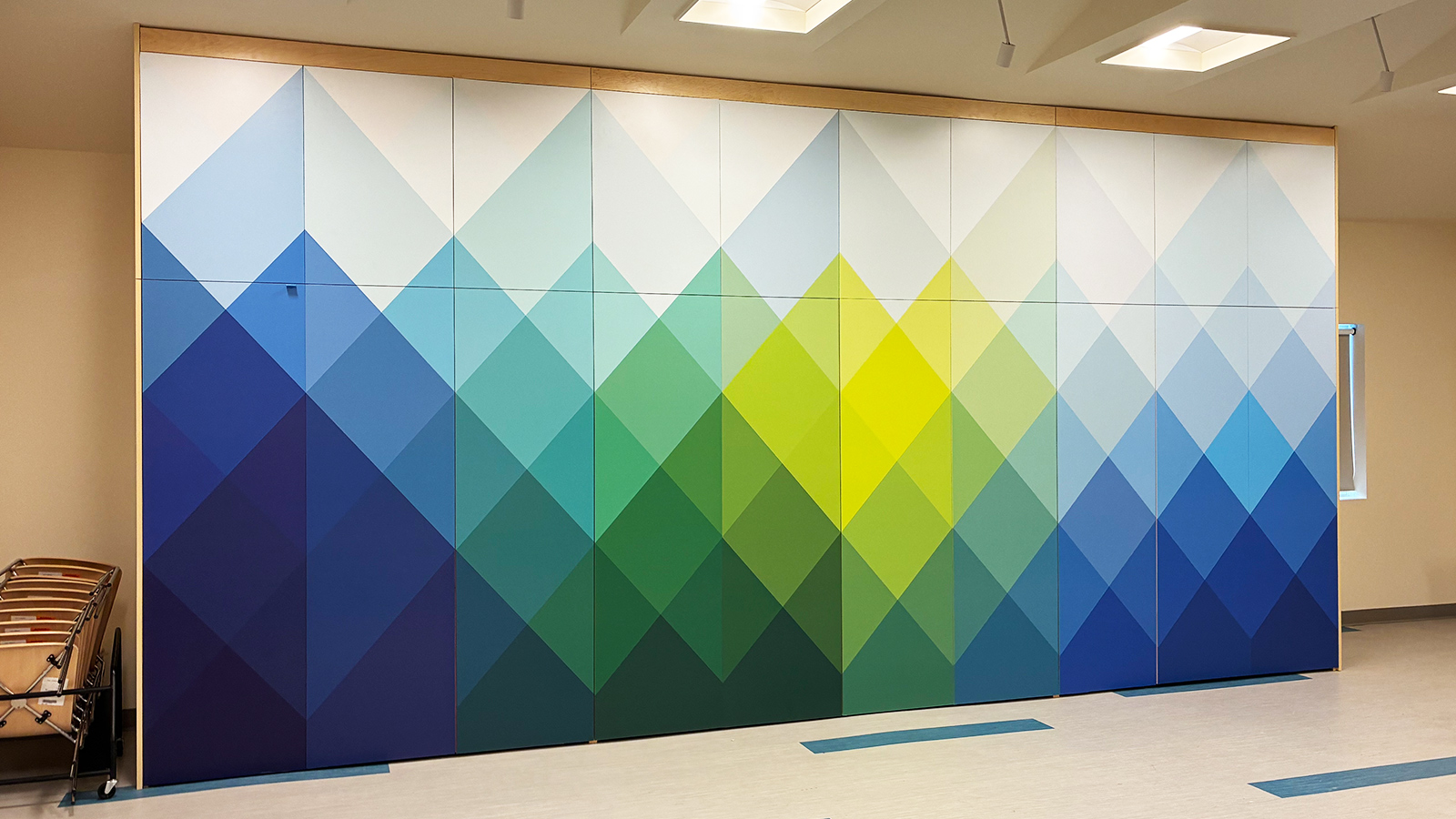 eleven eleven geometric vinyl wrap on cabinet wall