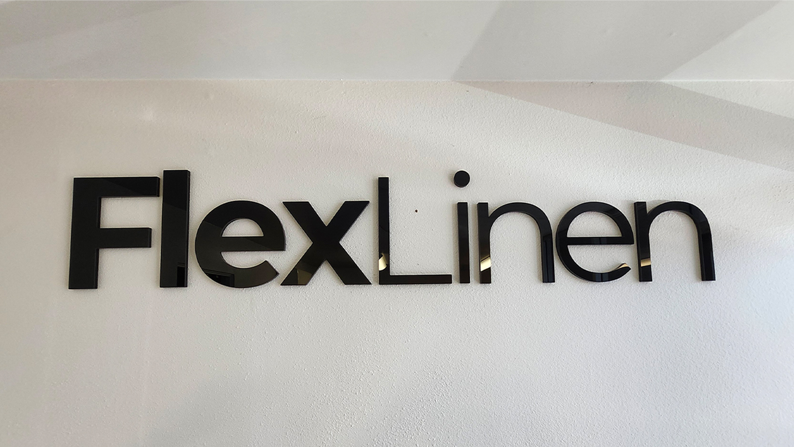 flexlinen black acrylic letters on interior wall