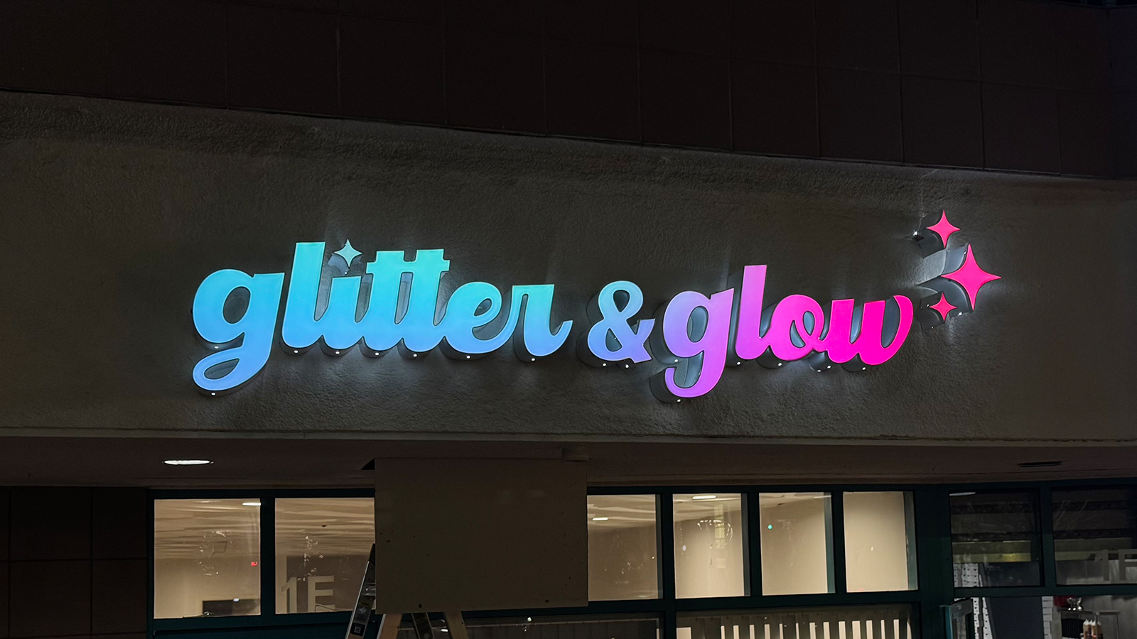 glitter glow front lit channel letters on facade