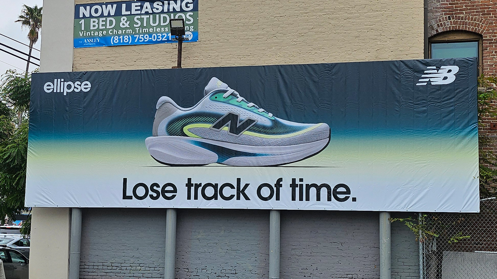 new balance vinyl banner on outdoor billboard frame