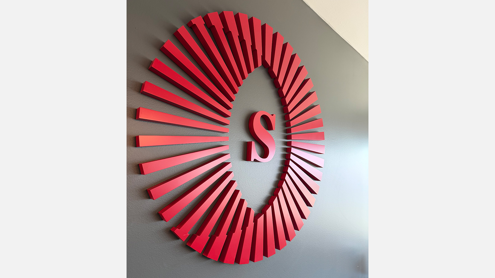 storm properties sunburst acrylic sign on wall