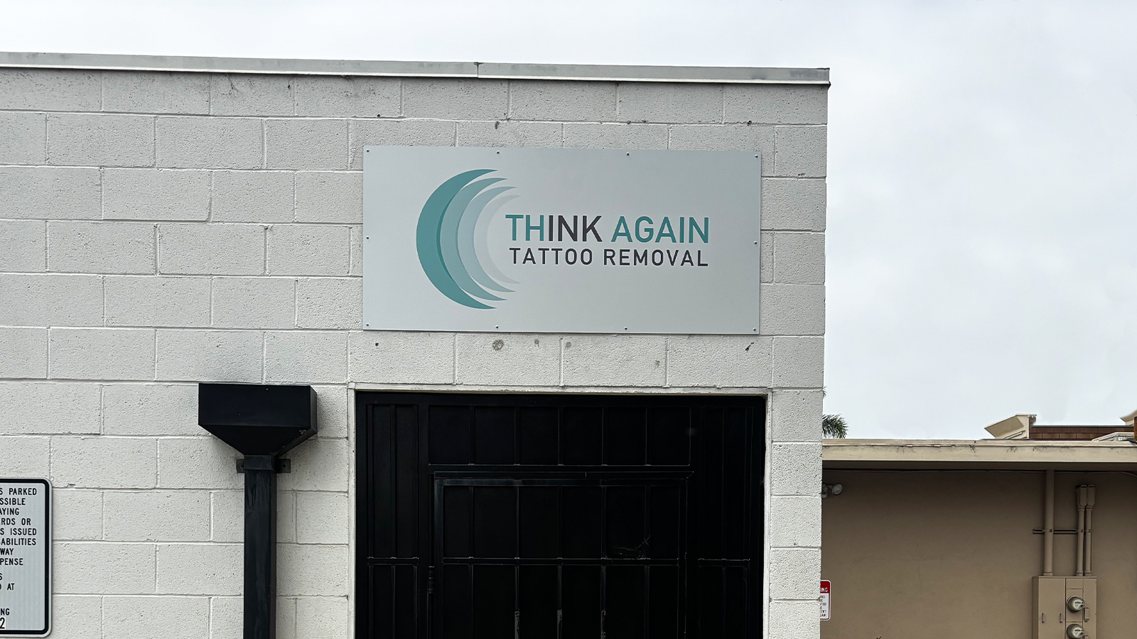 think again tattoo removal dibond sign above door